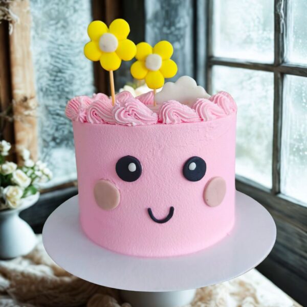 Bolo Rosa Kawaii decorado com rosto sorridente e flores amarelas, por encomenda com 72h de antecedência.