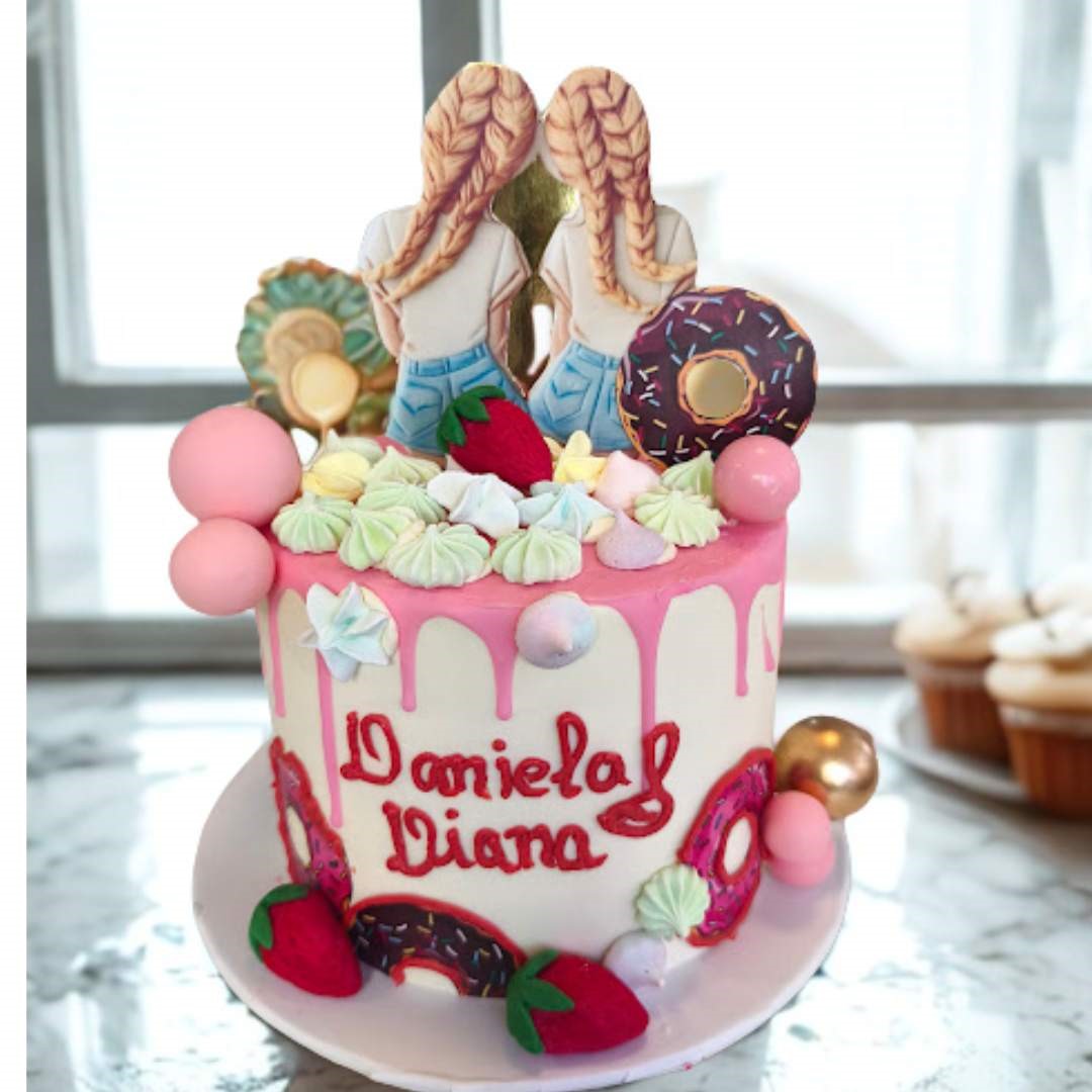 Playful cake with donuts, strawberries, and custom cookie toppers  perfect for  special moments during your trip!